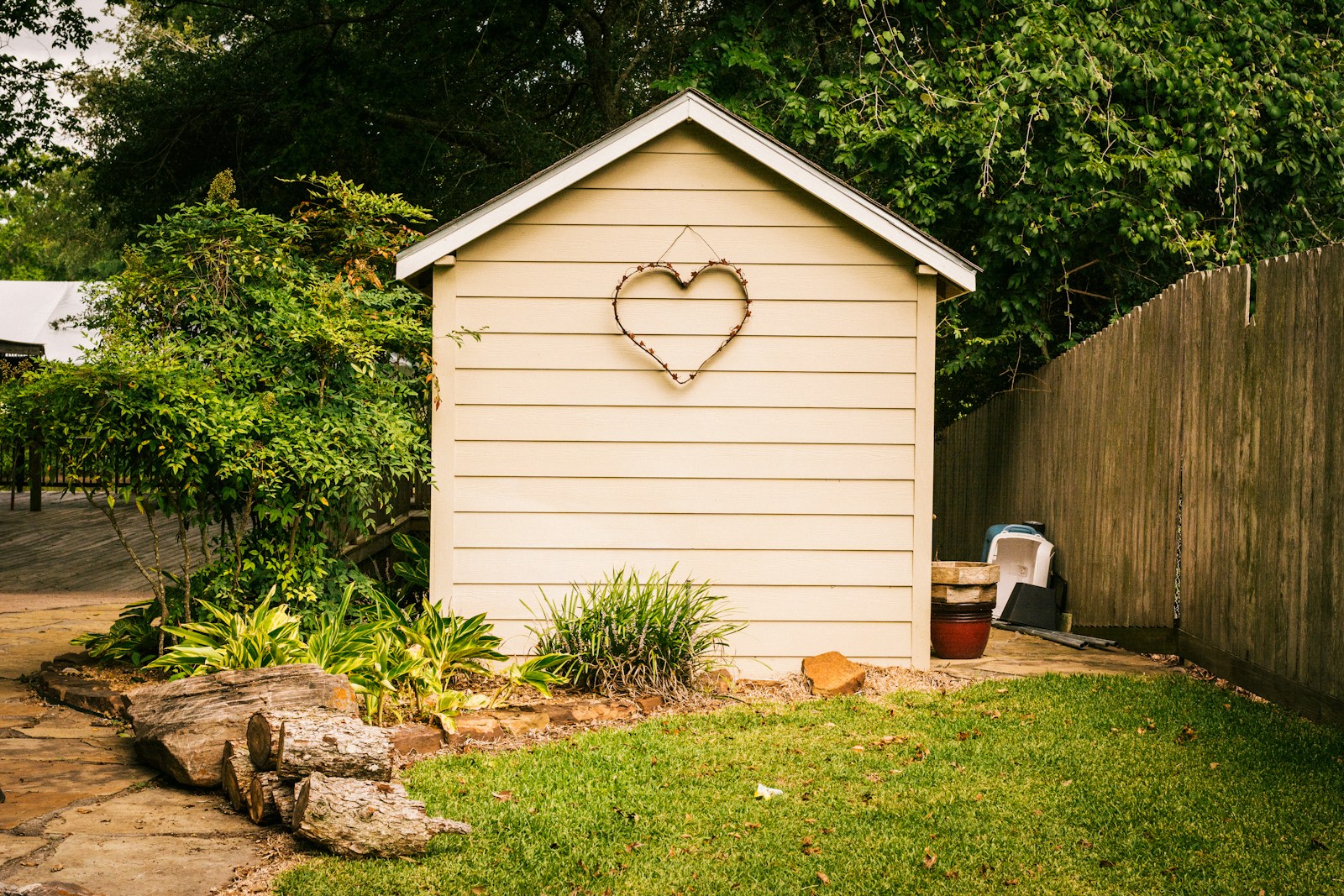a shed with a heart on the side of it
